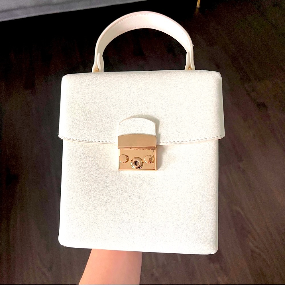 white and gold structured top handle mini satchel clutch crossbody
